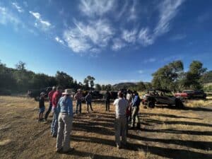 Group Circle Before Elk Ridge Fence Day